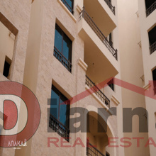 An apartment for immediate delivery in Anakaji Compound, New  Capital, with a 10% down payment only.